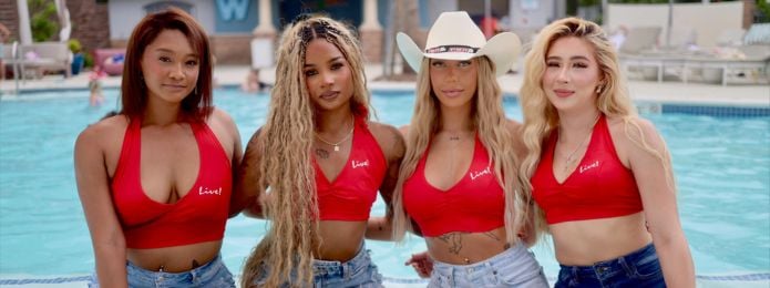 image of four girls wearing red tops by the pool at live casino