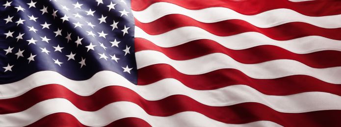 image of an american flag flying