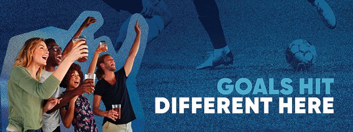 image of people celerbrating together. blue background with text that reads GOALS HIT DIFFERENT HERE