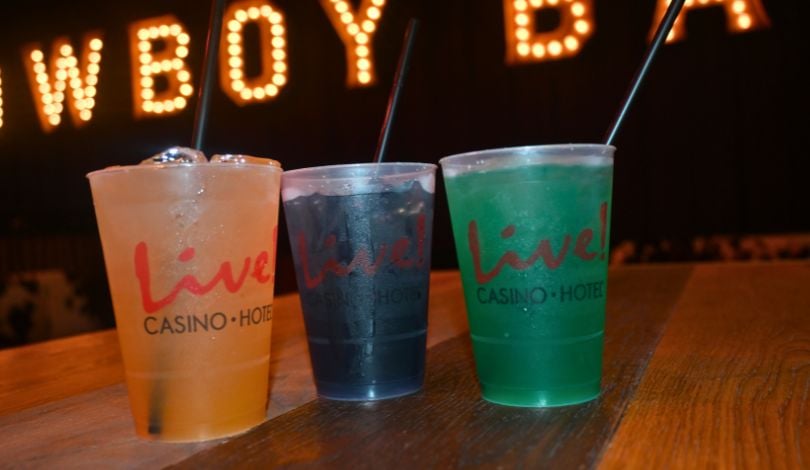 image of an orange cocktail, a purple cocktail, and a green cocktail at PBR Louisiana