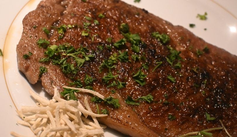 image of wagyu steak on a white plate at the prime rib louisiana