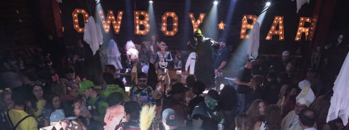 image of a halloween party at pbr cowboy bar