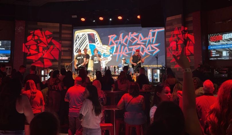 image of four men playing instruments on stage at PBR louisiana