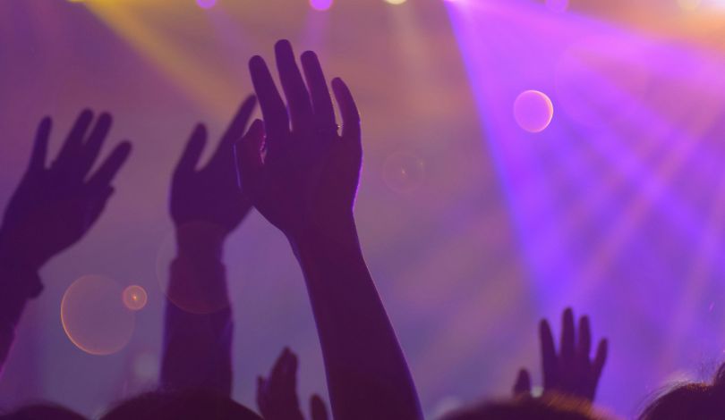 hands in the air at party