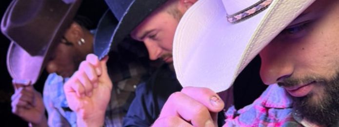 image of three men tipping their cowboy hats