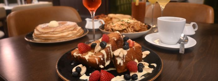 image of brunch plates on a table at ridotto grand cafe