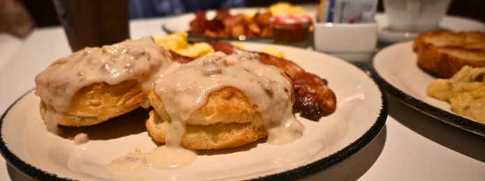 image of biscuits and gravy and other buffet items at ridotto