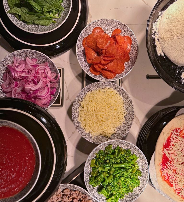 image of pizza sauce and pizza toppings
