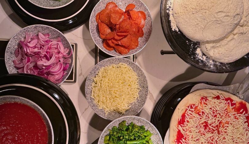 image of pizza sauce and pizza toppings
