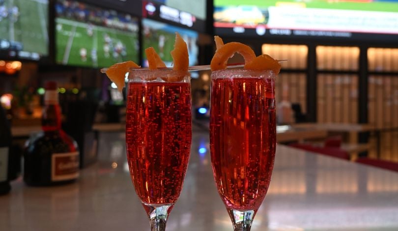 image of two red cocktails at sports & social louisiana