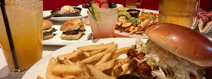image of food on a table at sports & social louisiana