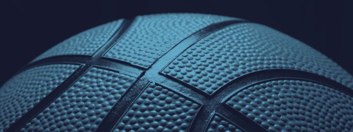 close up image of a basketball with a blue tint
