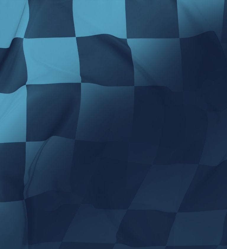 image of light blue and navy blue checkered race flag
