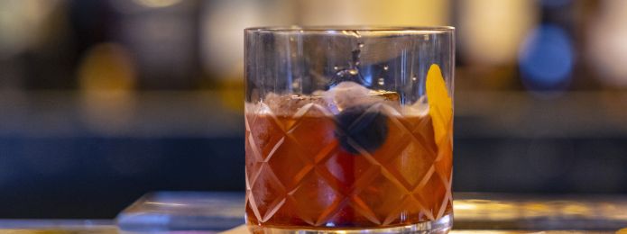 image of an old fashioned cocktail in a collins glass