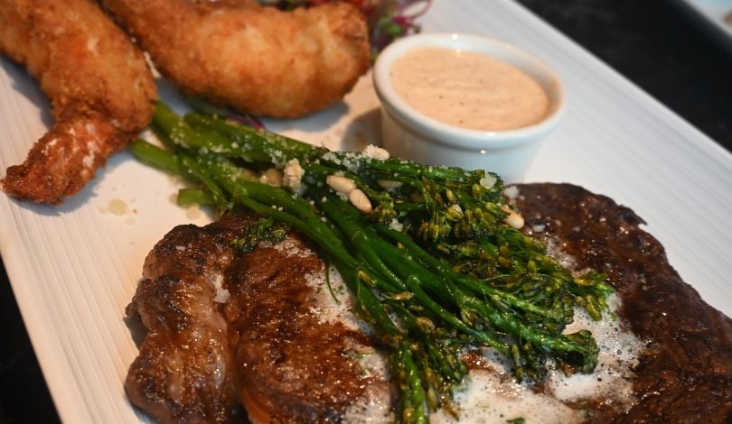 image of a steak with broccolini