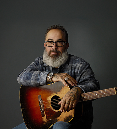 Aaron Lewis holding a guitar