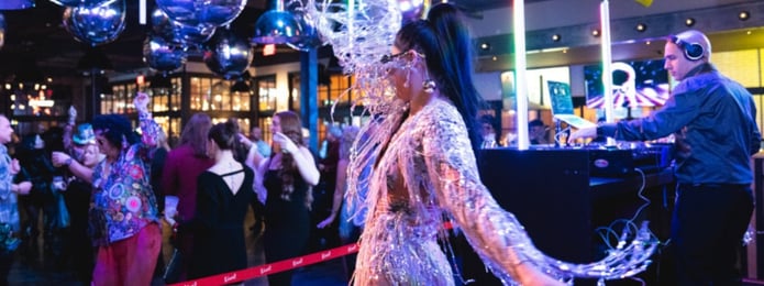 woman dancing at crowded party