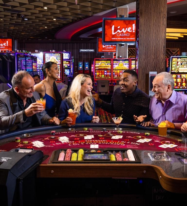 Group Playing Blackjack at Live! Casino®