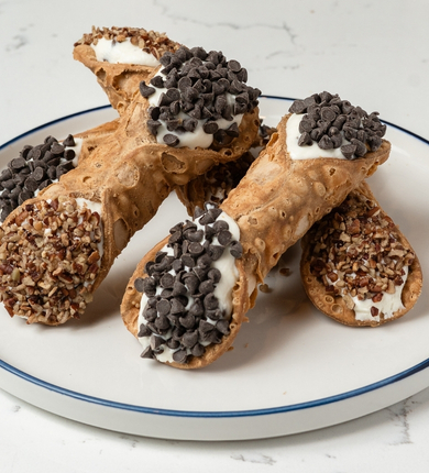 cannolis on a white background