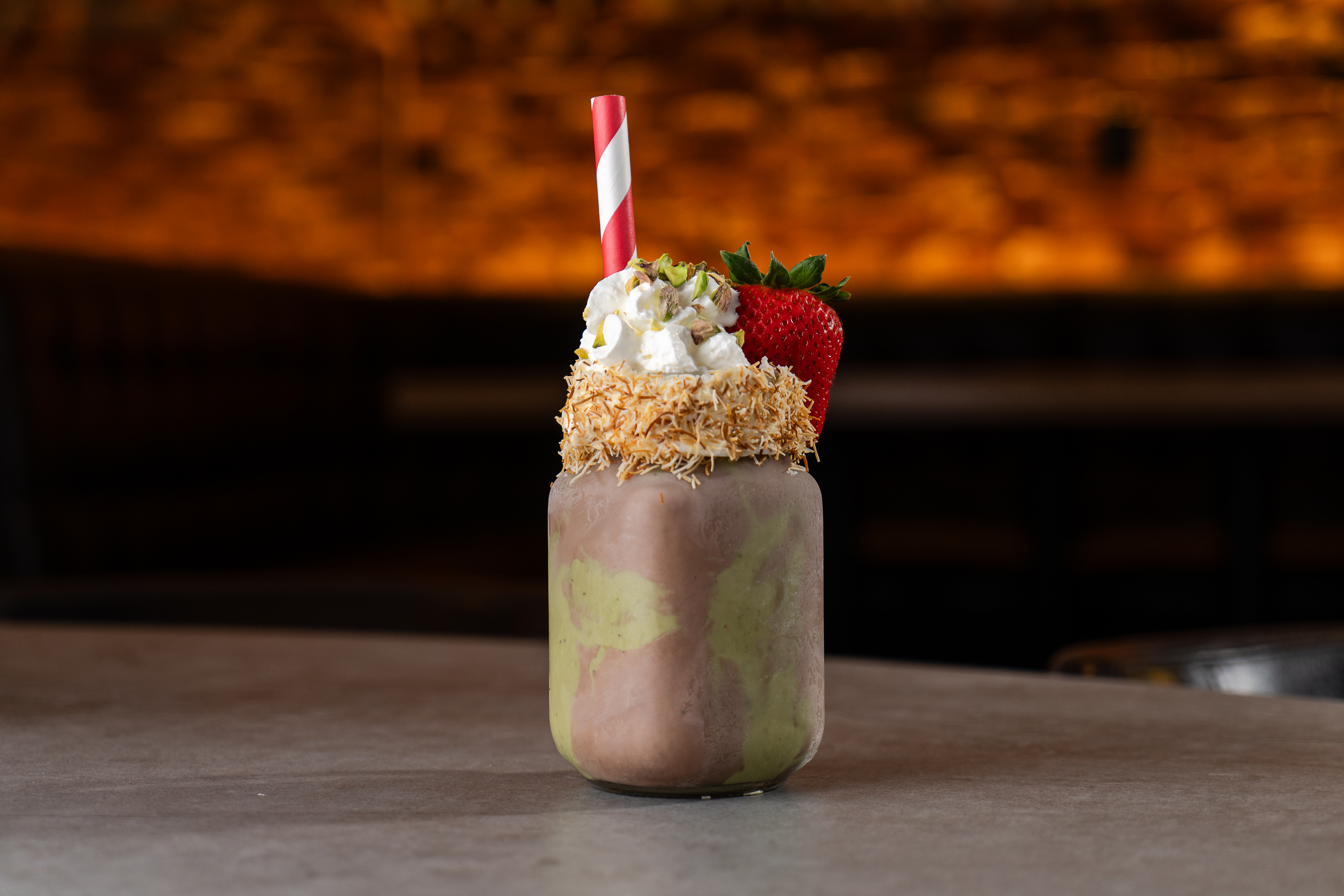 Strawberry milkshake with matcha and whip cream