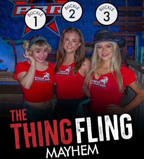 Three girls standing in PBR Cowboy Bar