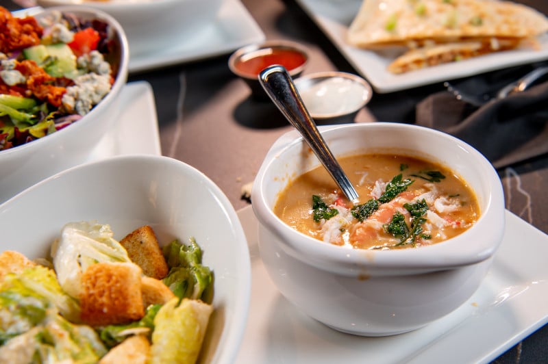 cup of soup and caesar salad