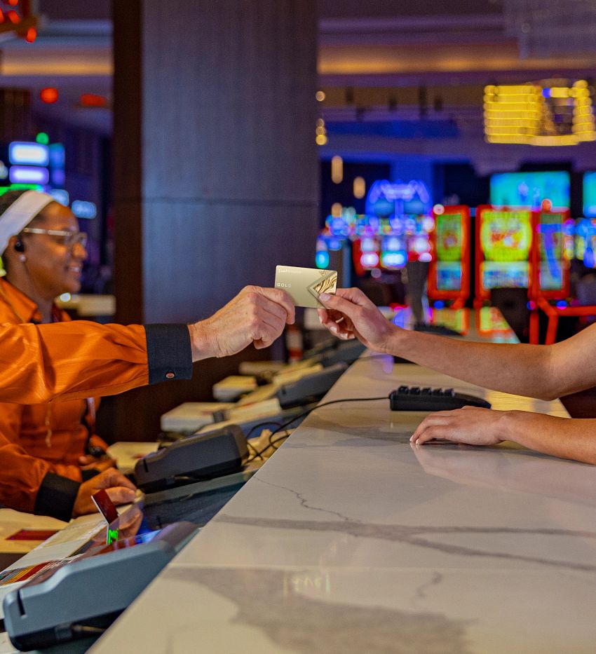  Guest using Live! Rewards card at check in.