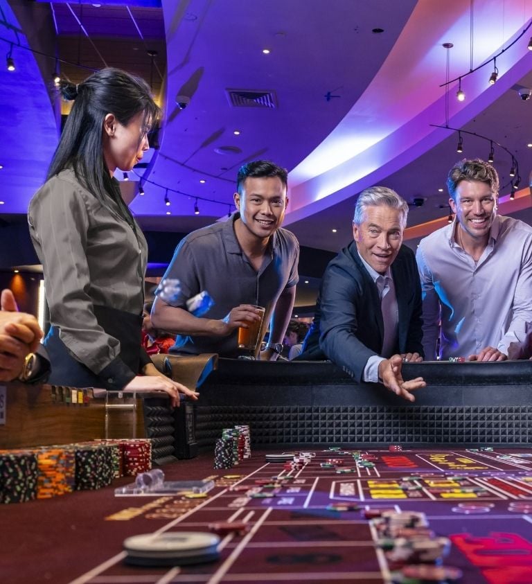 Guests playing Craps at Live! Casino