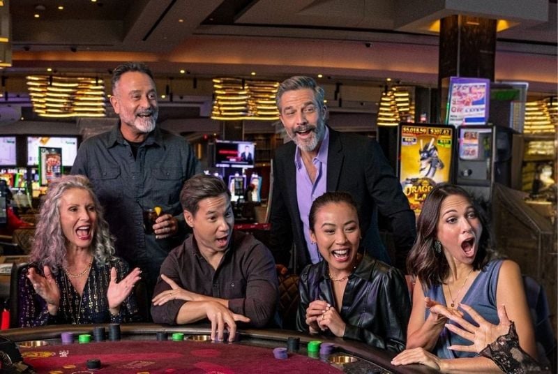 Guests playing baccarat at Live! Casino.