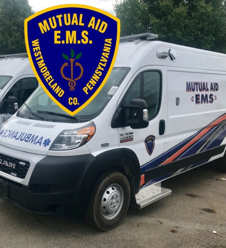 Image of a Mutual EMS ambulance and Mutual EMS logo
