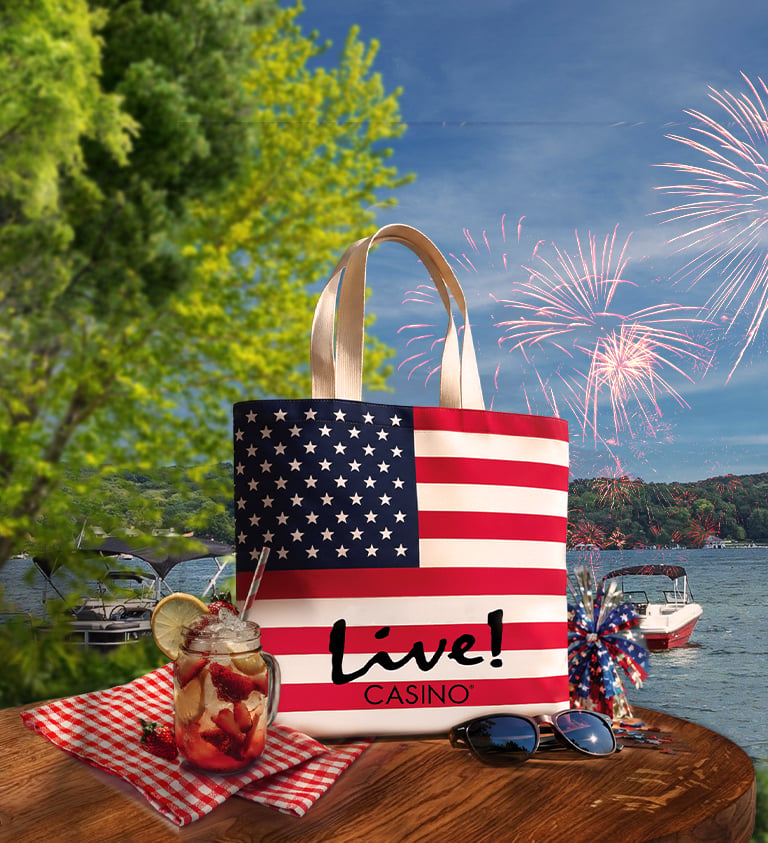 4th of july themed live tote bag against a lake background