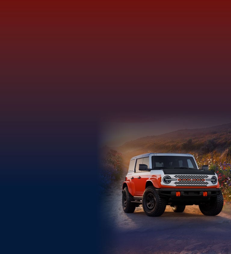 red white and blue background with a ford bronco in the foreground on the right