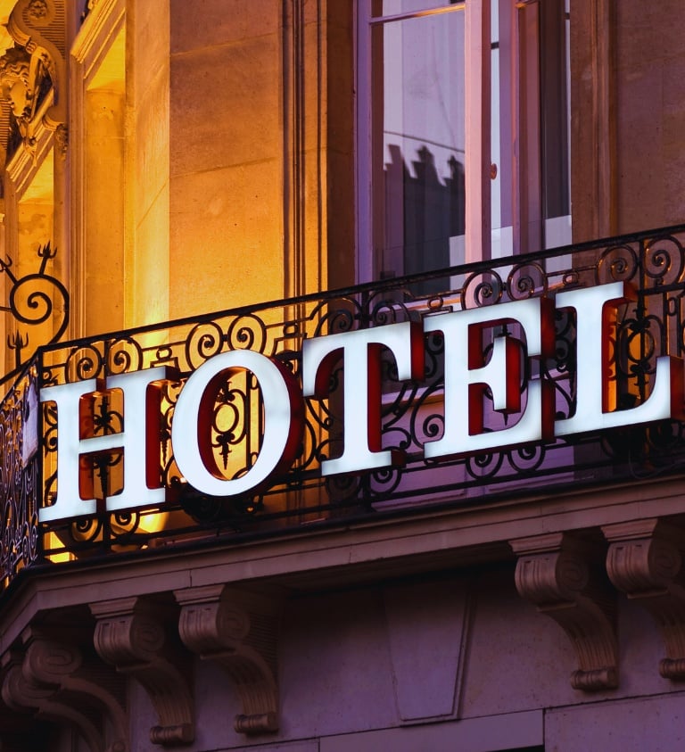 Image of the word HOTEL on the side of a building