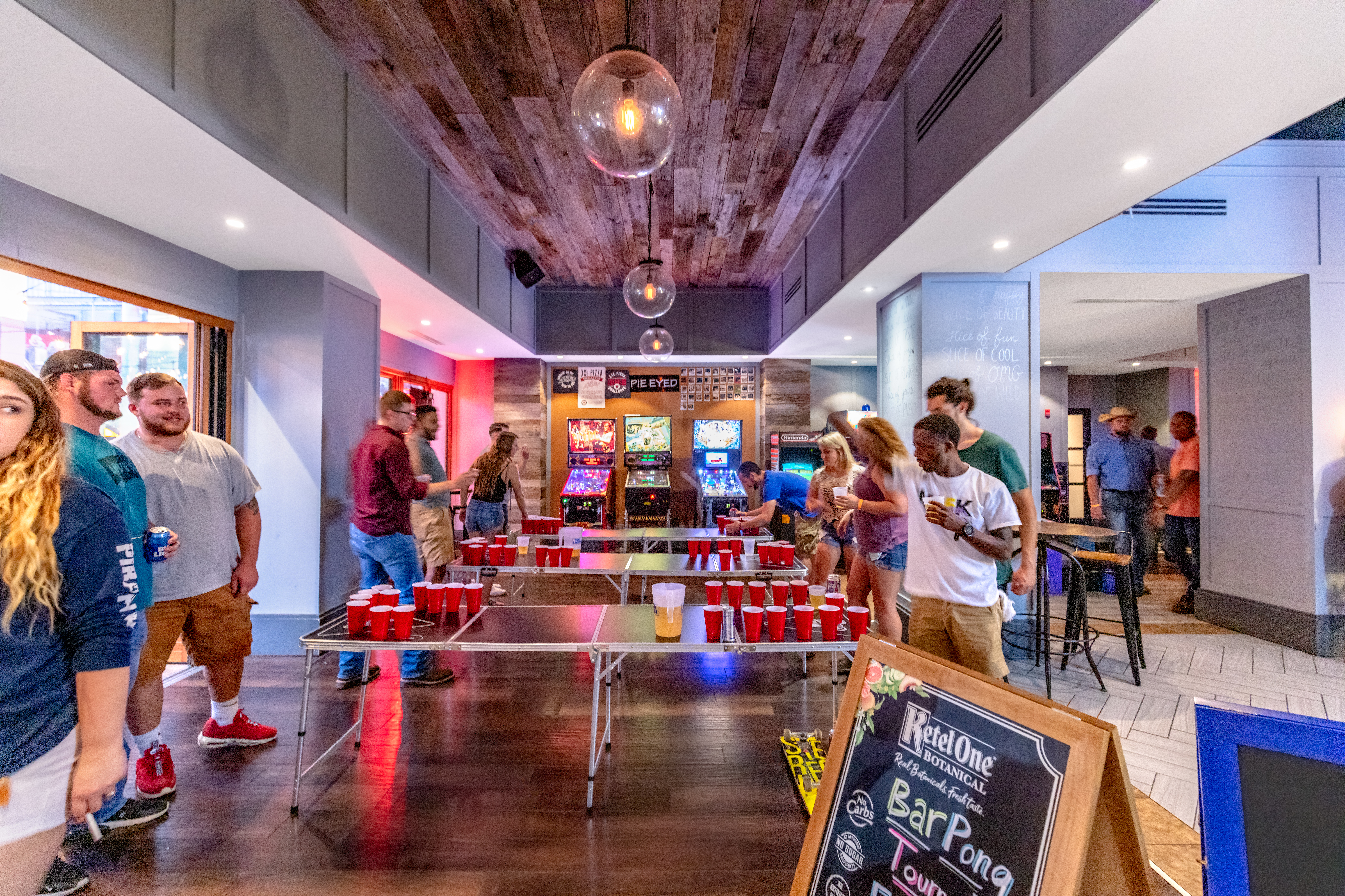 Guests playing games at Pizza Bar