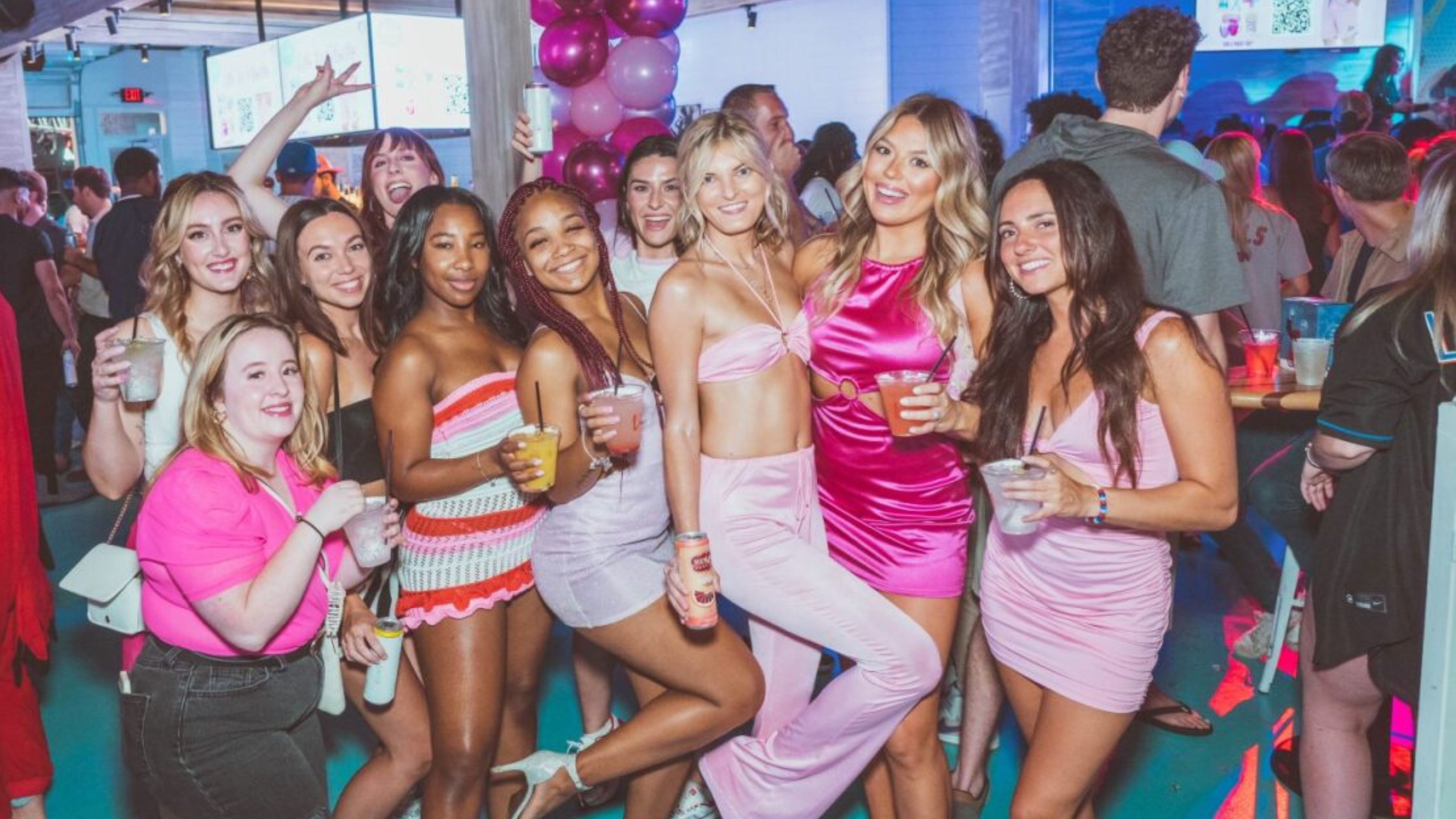 Group of girls celebrating Love Island themed party in Shark Bar