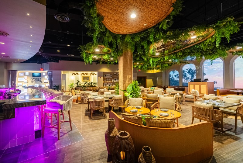 Dining area at Palm Tree Club at Live! at the Pointe Orlando.