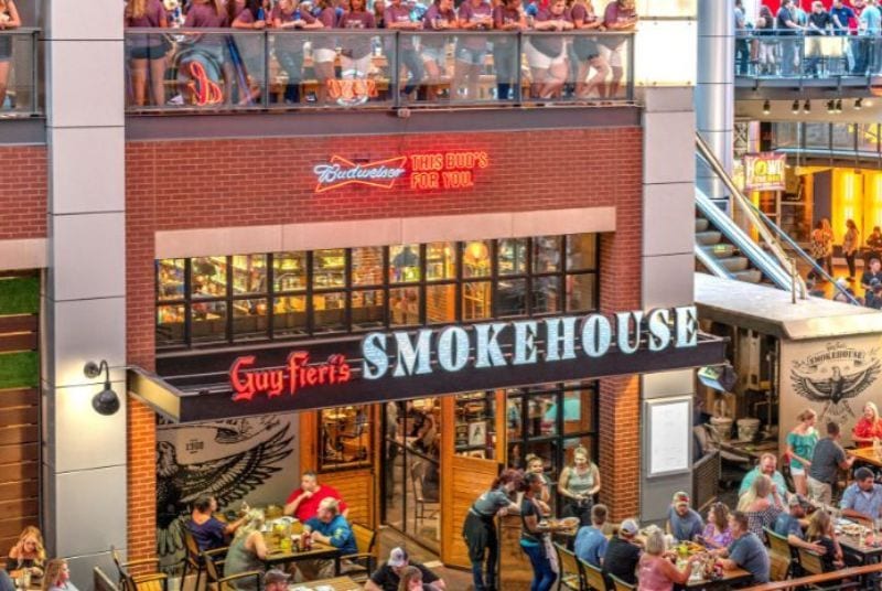 Guy Fieri's Smokehouse is bustling with customers, a fan favorite at Fourth Street Live.