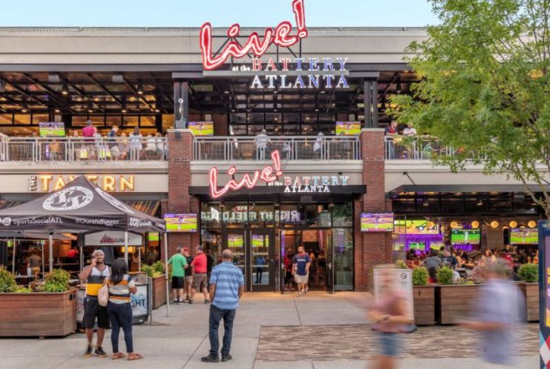 Outside the entrance of Live! at the Battery Atlanta, great restaurants like the Tavern await, and they have the game on!