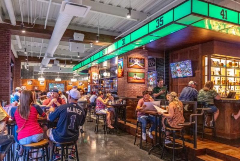 At the Tavern, sports fans enjoy catching up over beers and good food while keeping a close eye on the game.