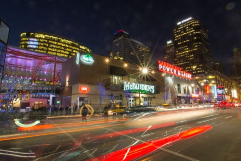 A time-lapse view of the car lights and neon signs of Grand Boulevard in Kansas City's Power & Light District.