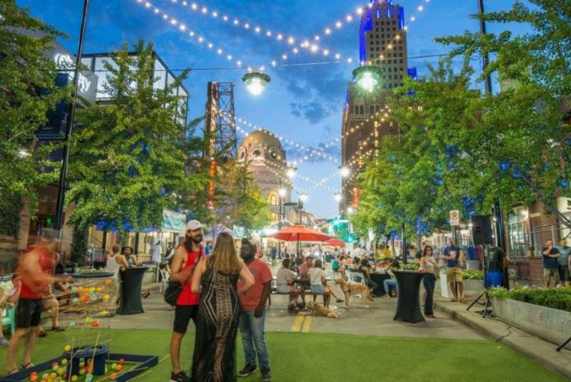 Urbana attendees enjoy games, sampling gourmet food and drinks, and walking their dogs in the beautiful Power & Light District.