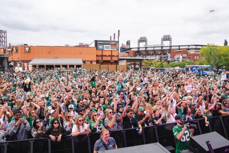 Crowd outside at football gameday.