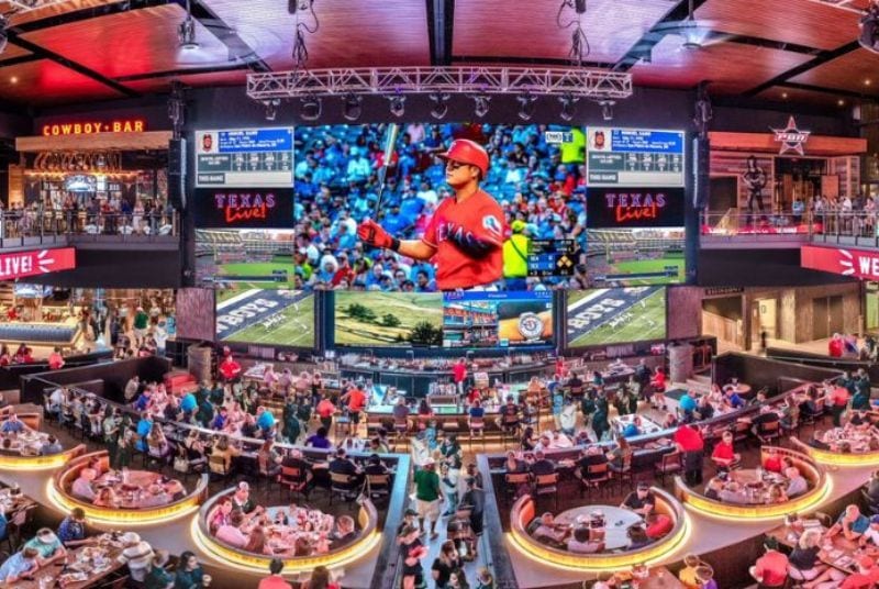 A panoramic look inside Texas Live! as both Rangers and Cowboys games play on big LED screens for hungry diners.