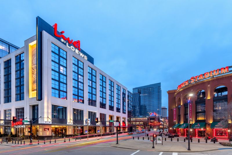 A time-lapse view of the Live! by Loews Hotel and the lit-up Busch Stadium across the street.