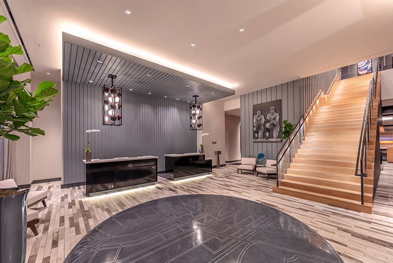 The stylish lobby of the Live! by Loews Hotel features a baseball portrait in honor of its Busch Stadium neighbor.