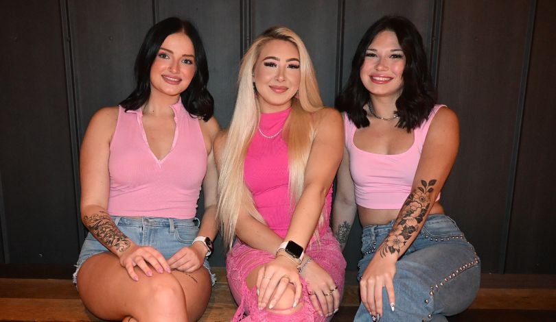 image of three girls wearing pink at pbr louisiana