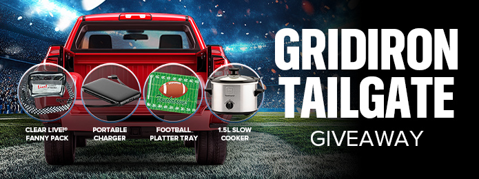 gridiron tailgate text next to a red truck