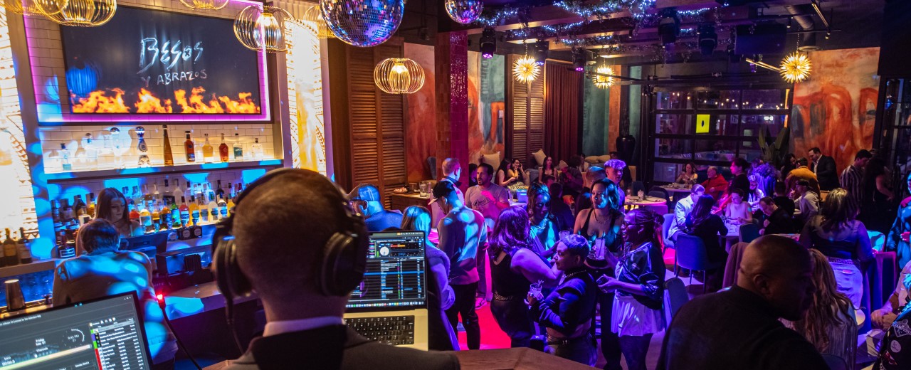View from DJ booth of restaurant goers at Besos y Abrazos.