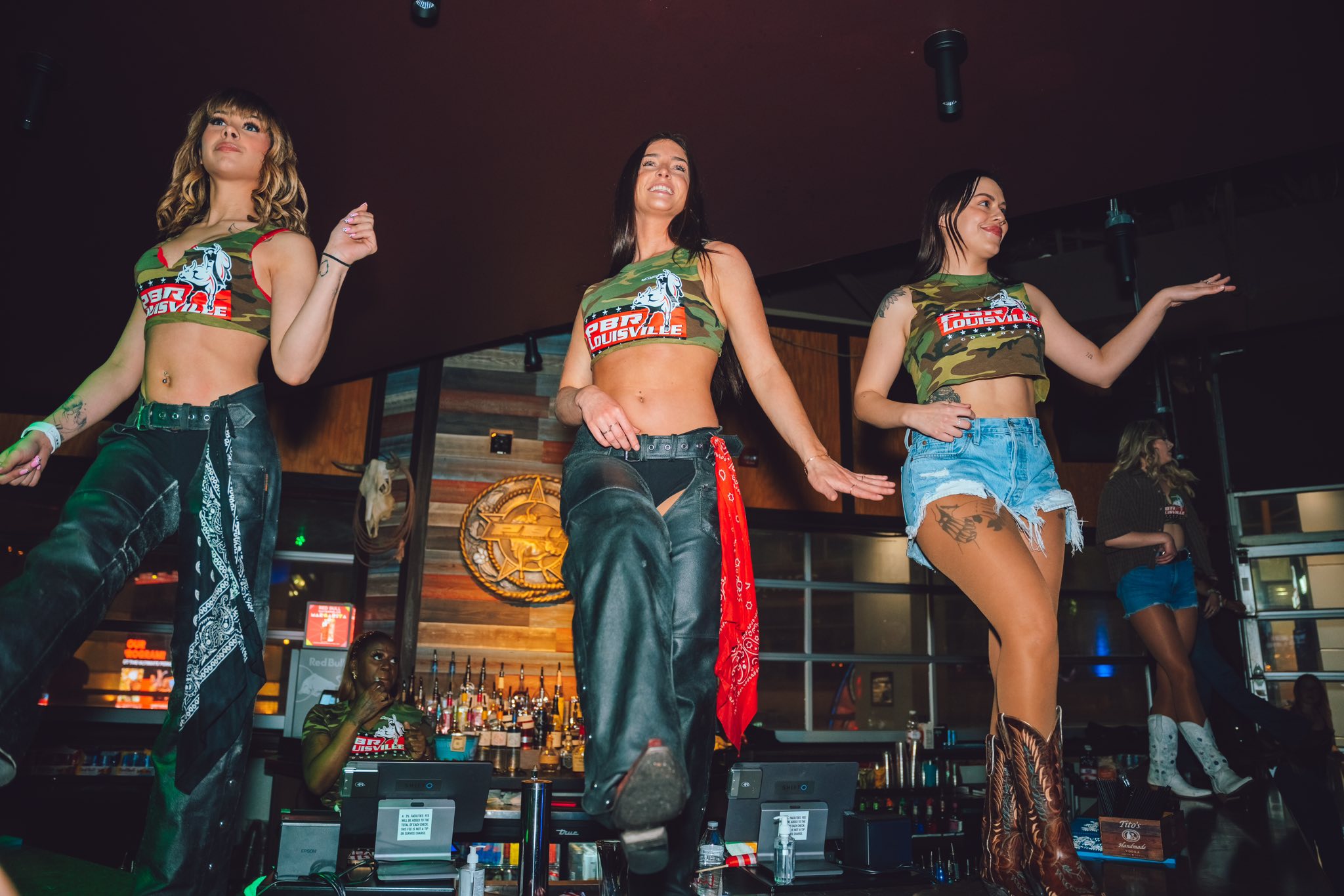 buckle bunnies dancing on bar