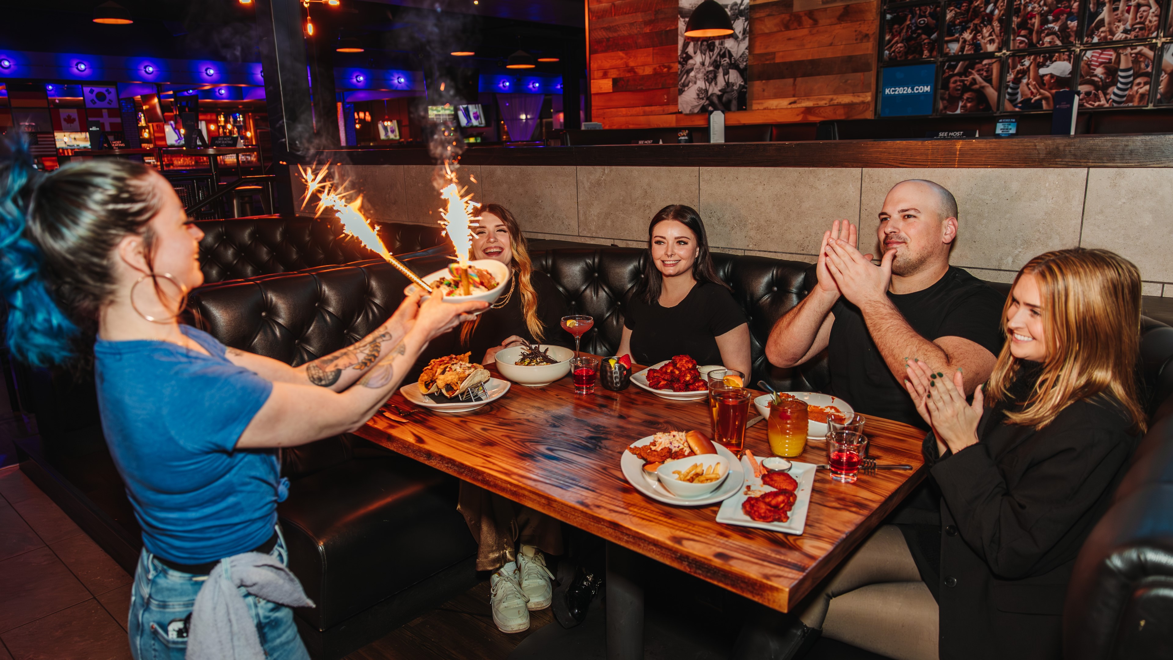 Small party enjoying VIP table service.